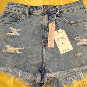 Distressed denim shorts